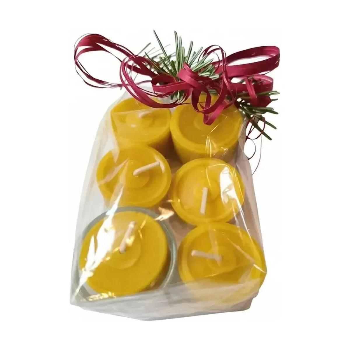 Sechs gelbe Teelichter aus Bienenwachs in einer Geschenktüte mit roter Schleife