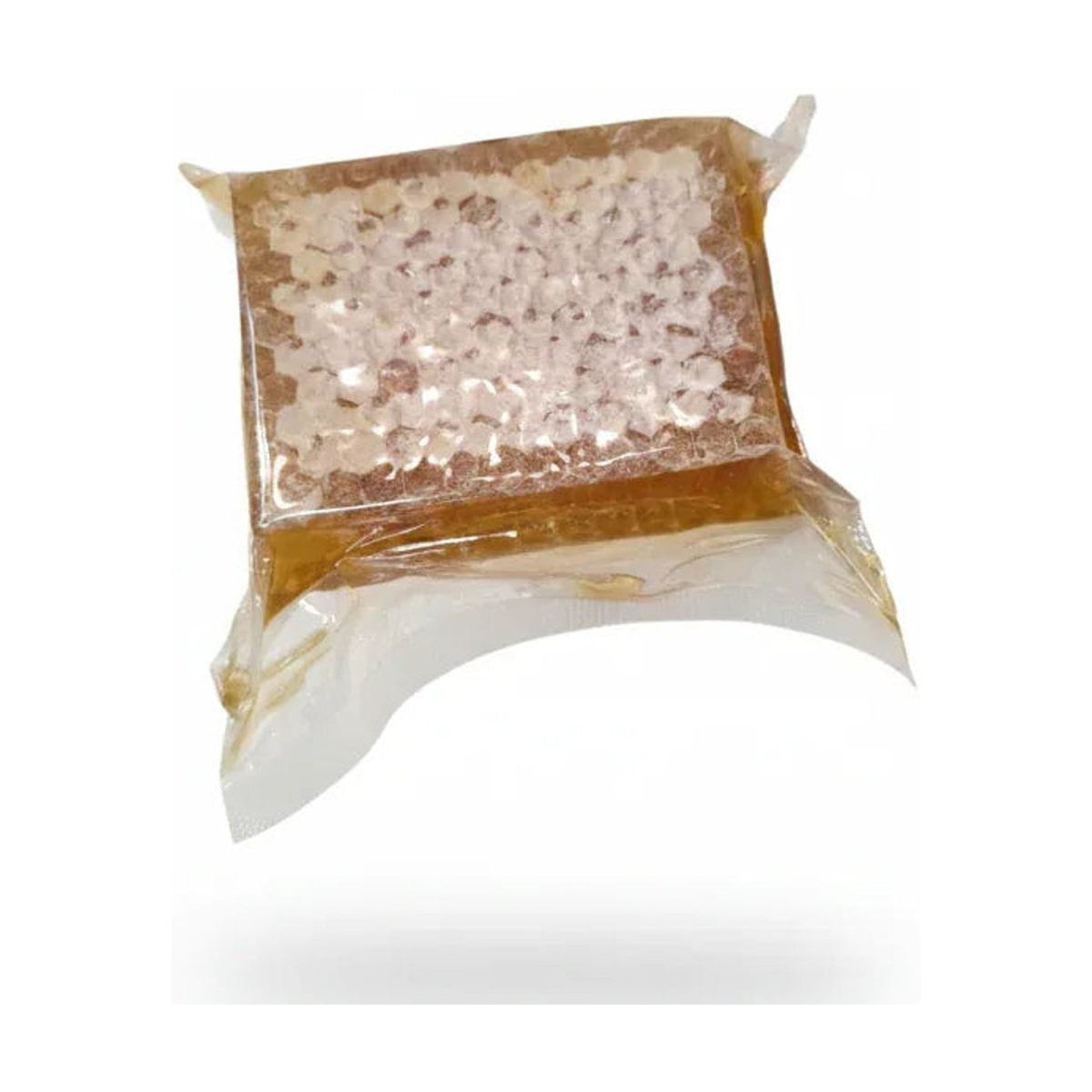 Stück Wabenhonig in der Verpackung, unverdeckelte Waben mit Honig