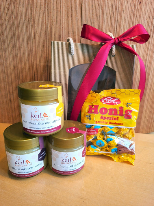 Geschenkpaket 2 vom Bienenhof Keil mit Frühjahrsblütenhonig, Sommerblütenhonig, Sommerblüte mit Silphie, Honig-Bonbons und Geschenktasche mit Schleife